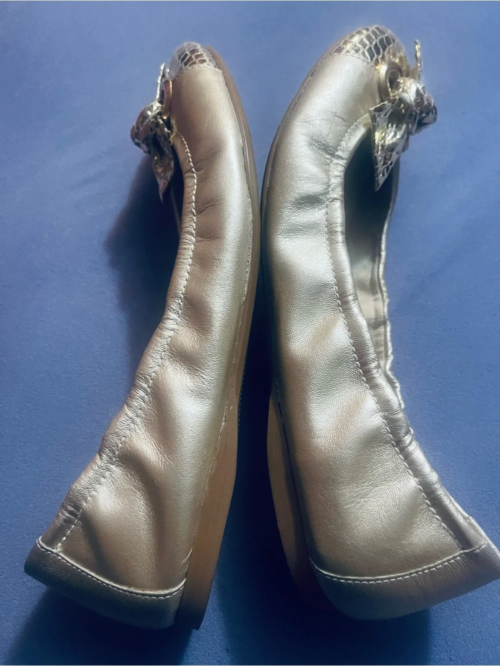 Stuart Weitzman Metallic Gold Ballet Flats with Bow Accent